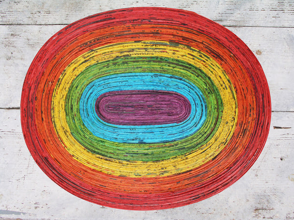 Newspaper table mat - oval, 8 colours