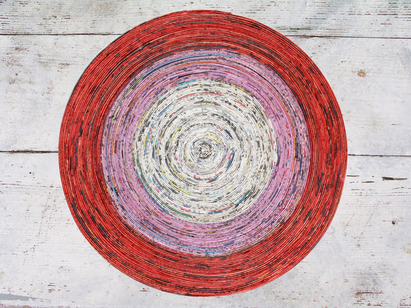 Newspaper table mat - round, large; 7 colours