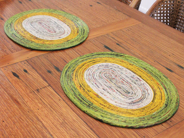 Newspaper table mat - oval, 8 colours