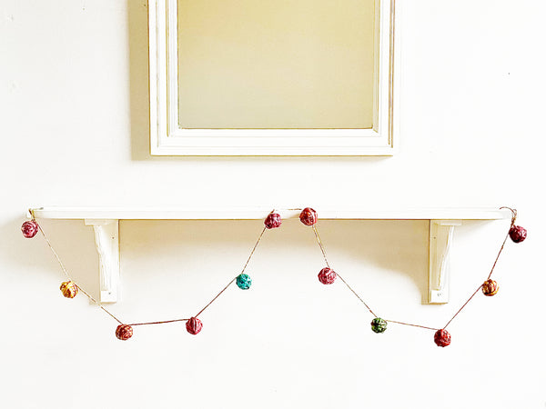 Newspaper ornaments, small - garland of 12 baubles; assorted colours