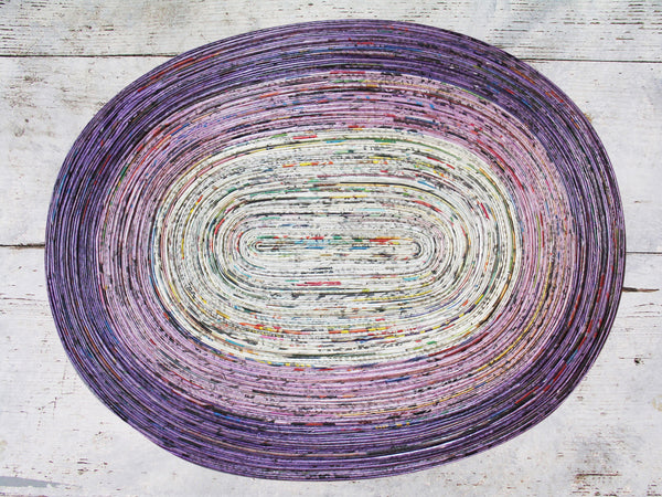 Newspaper table mat - oval, 8 colours