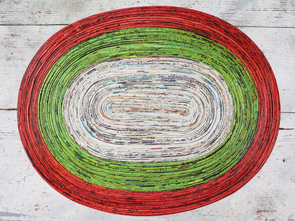 Newspaper table mat - oval, 8 colours