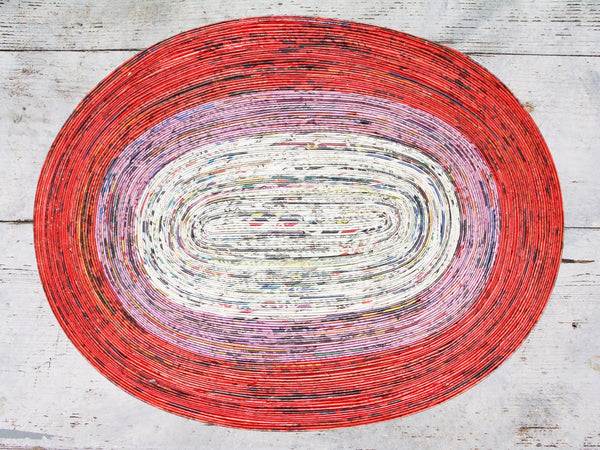 Newspaper table mat - oval, 8 colours