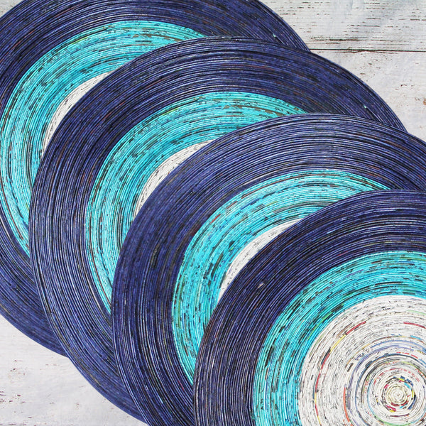 Newspaper table mat - round, large; 7 colours