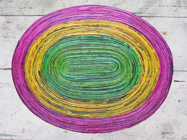 Newspaper table mat - oval, 8 colours