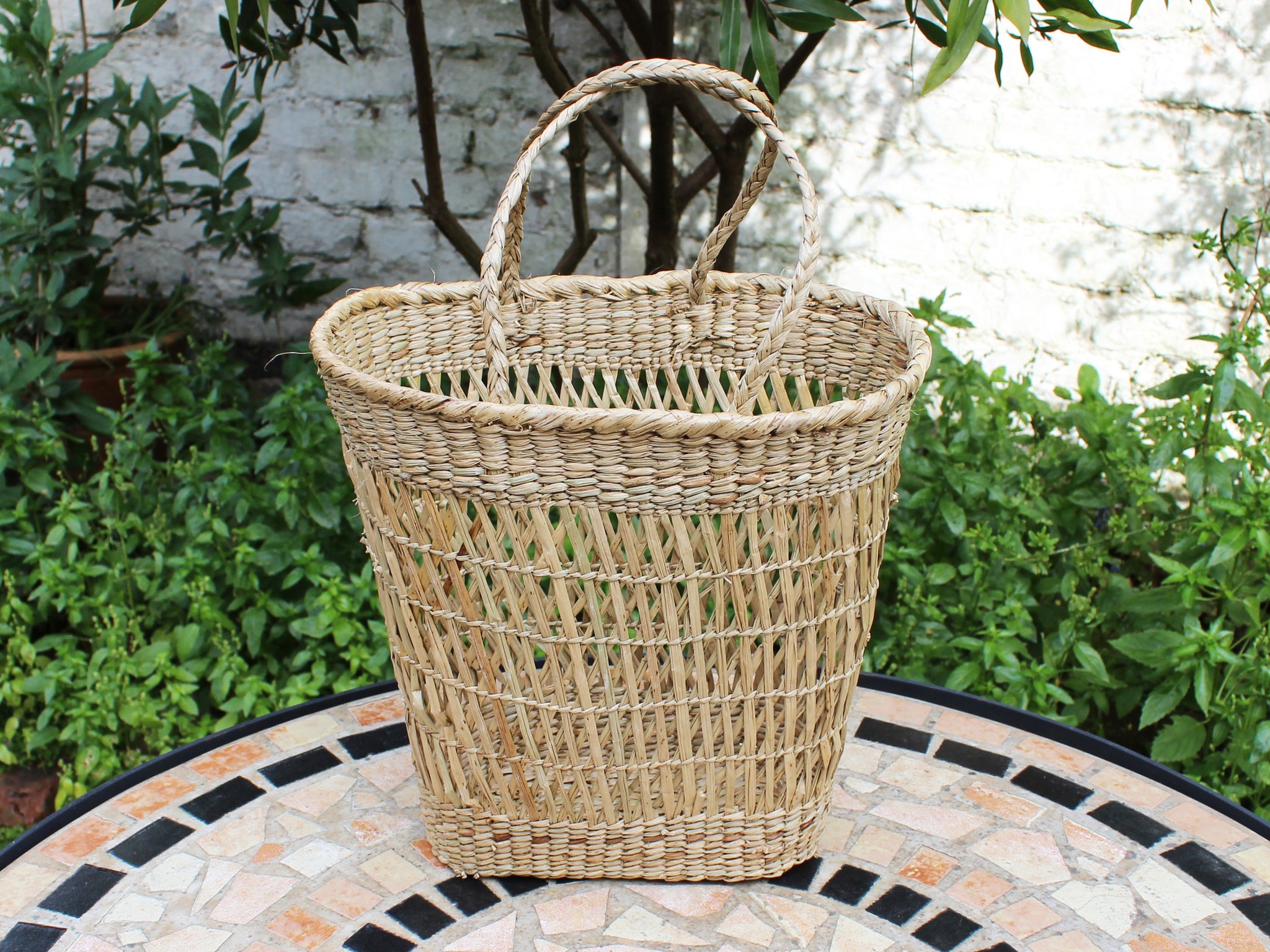 Cane and palmyra reed basket