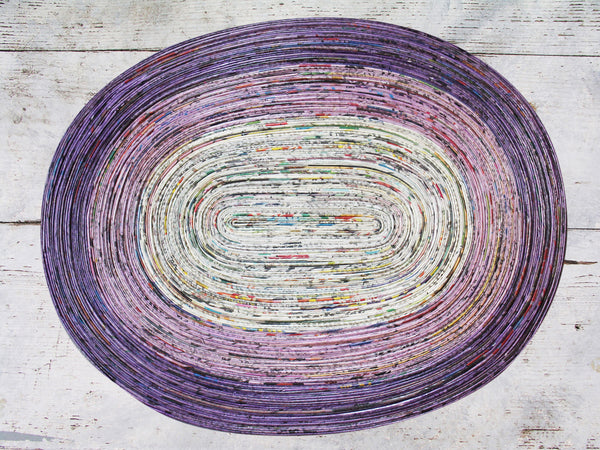 Newspaper table mat - oval, 7 colours